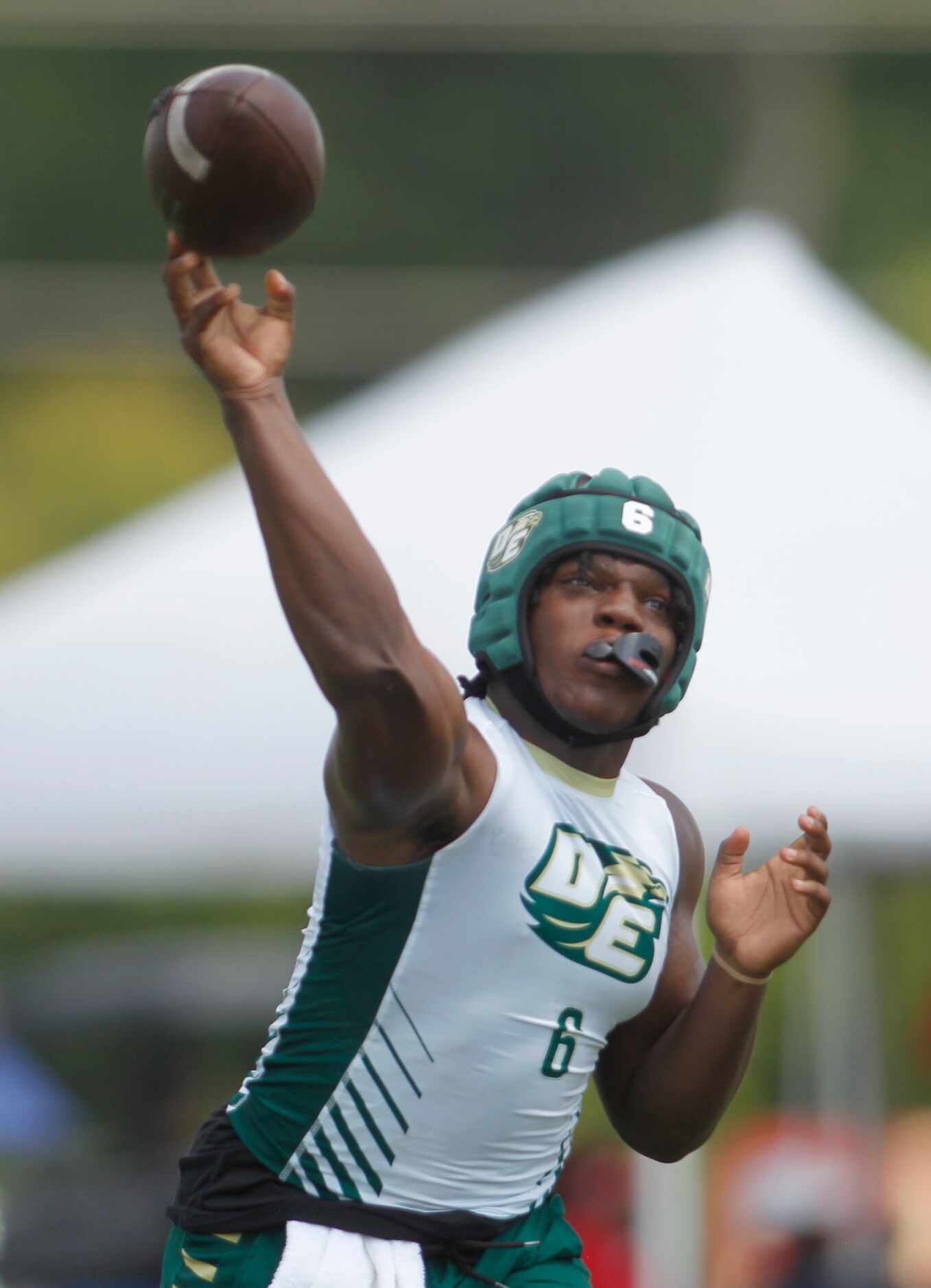 DeSoto Matt Allen (6) launches a long pass downfield during day 1 competition against...
