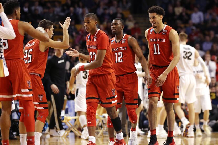 BOSTON, MA - MARCH 23: Jarrett Culver #23, Keenan Evans #12 and Zach Smith #11 of the Texas...