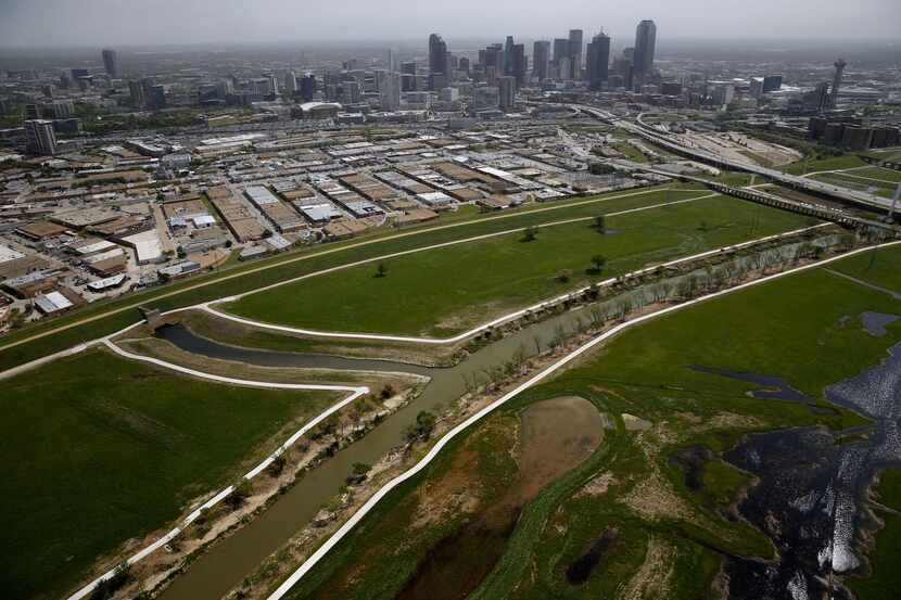 
Some day, Dallas will have a parkway and a park in the land between its aging levees — if...