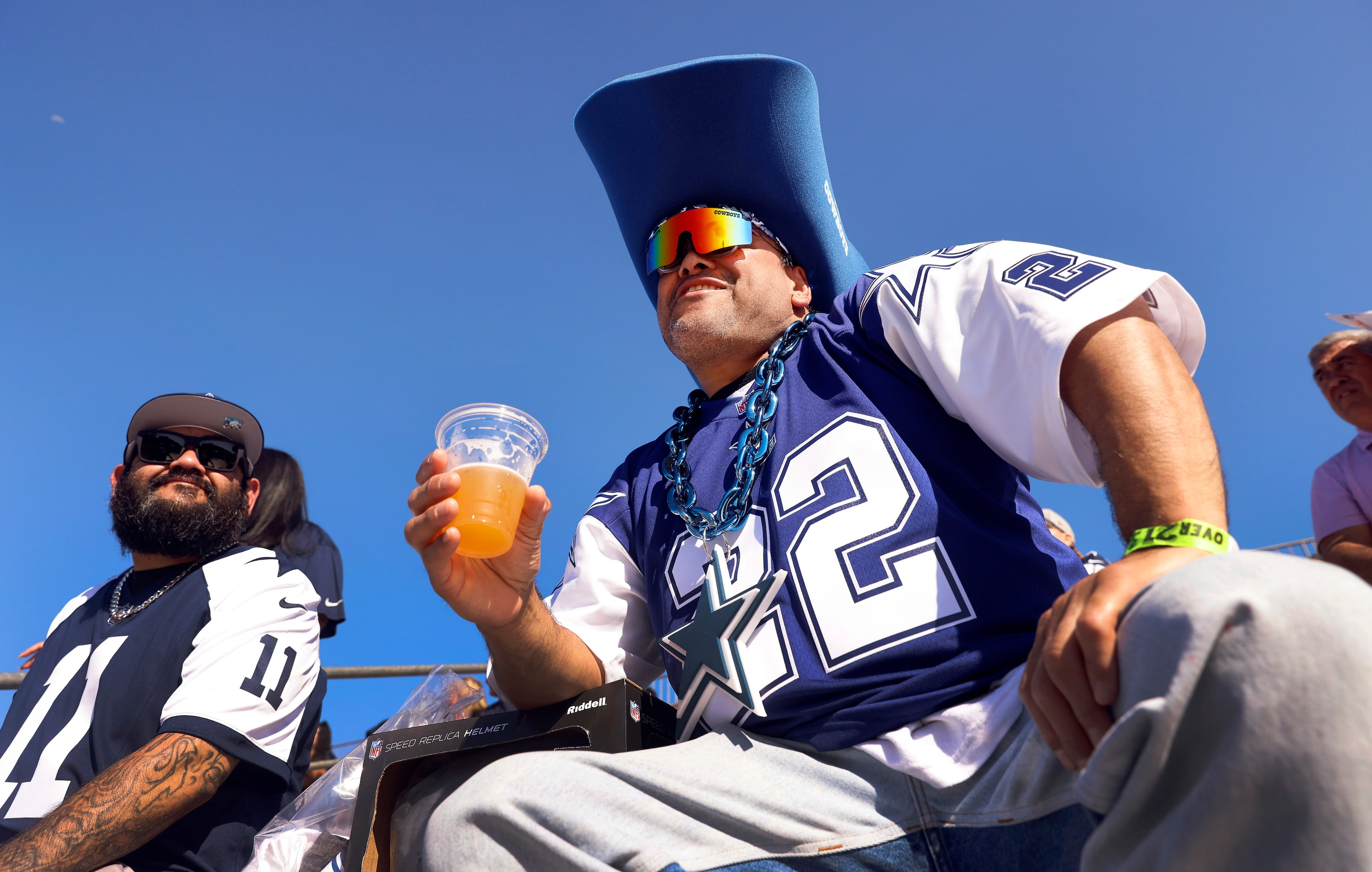 Manuel Madrigal of San Bernardino, California takes in a training camp practice in Oxnard,...