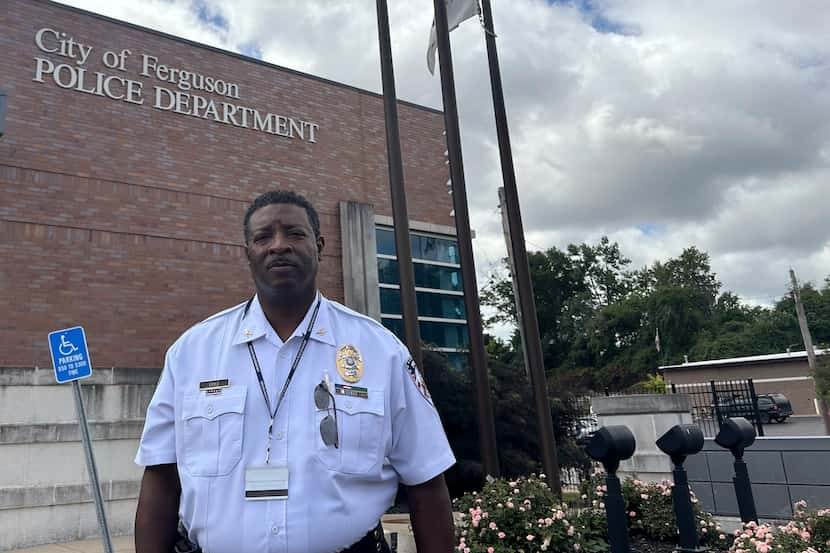 Police Chief Troy Doyle stands in front of the Ferguson Police Station on Friday, Aug. 2,...