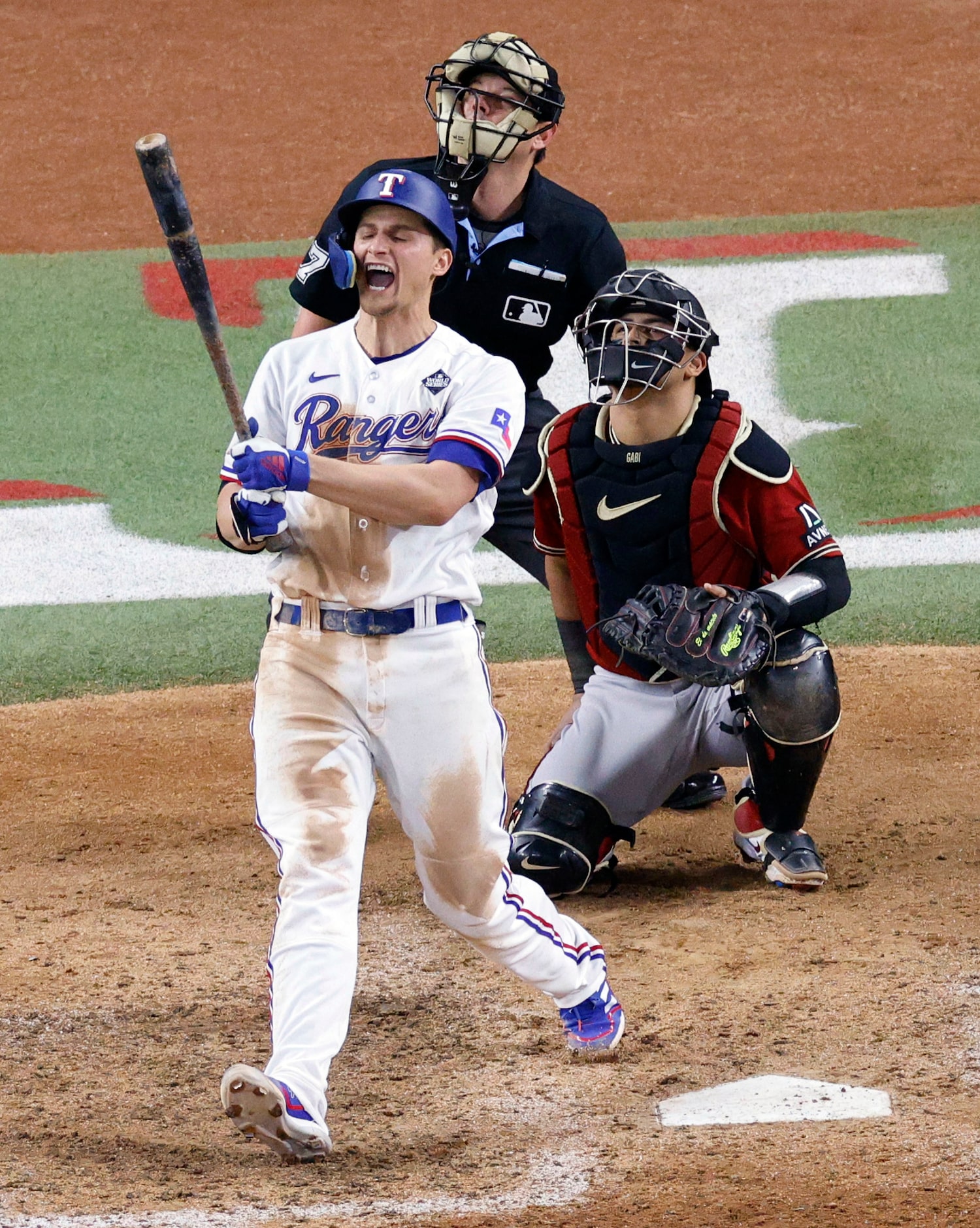 Texas Rangers shortstop Corey Seager (5) reacts after he hit a home run during the ninth...