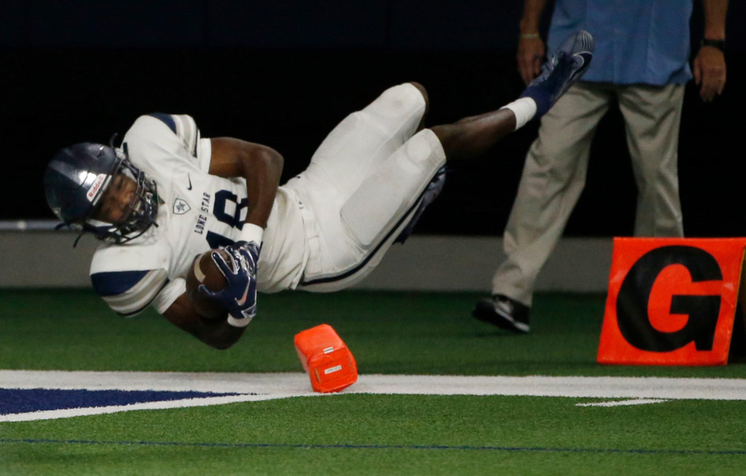 Frisco Lone Star receiver Marvin Mims (18) scores his second touchdown against Frisco...