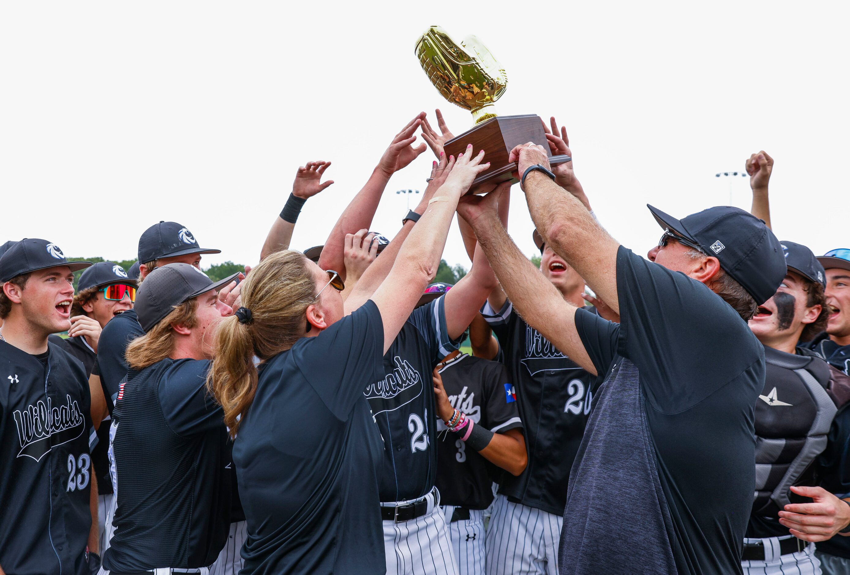 Denton Guyer players cheer after winning a baseball game against Byron Nelson High School on...