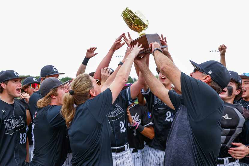 Denton Guyer players cheer after winning a baseball game against Byron Nelson High School on...