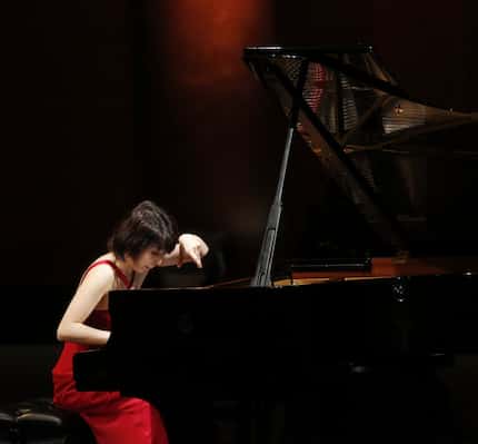 Claire Huangci performs during the preliminary round of the Van Cliburn International Piano...