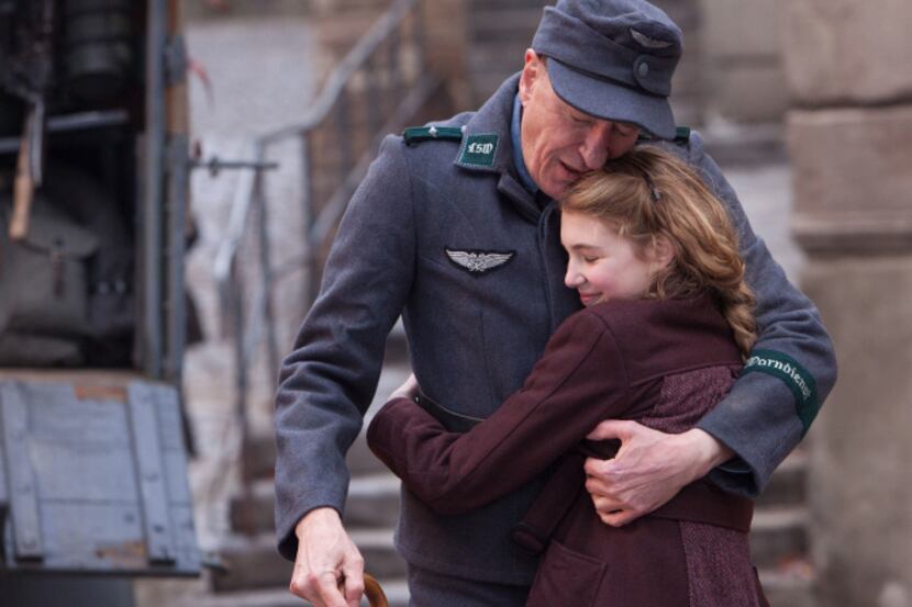 Liesel (Sophie Nélisse) and her foster father Hans (Geoffrey Rush) share a quiet moment in...