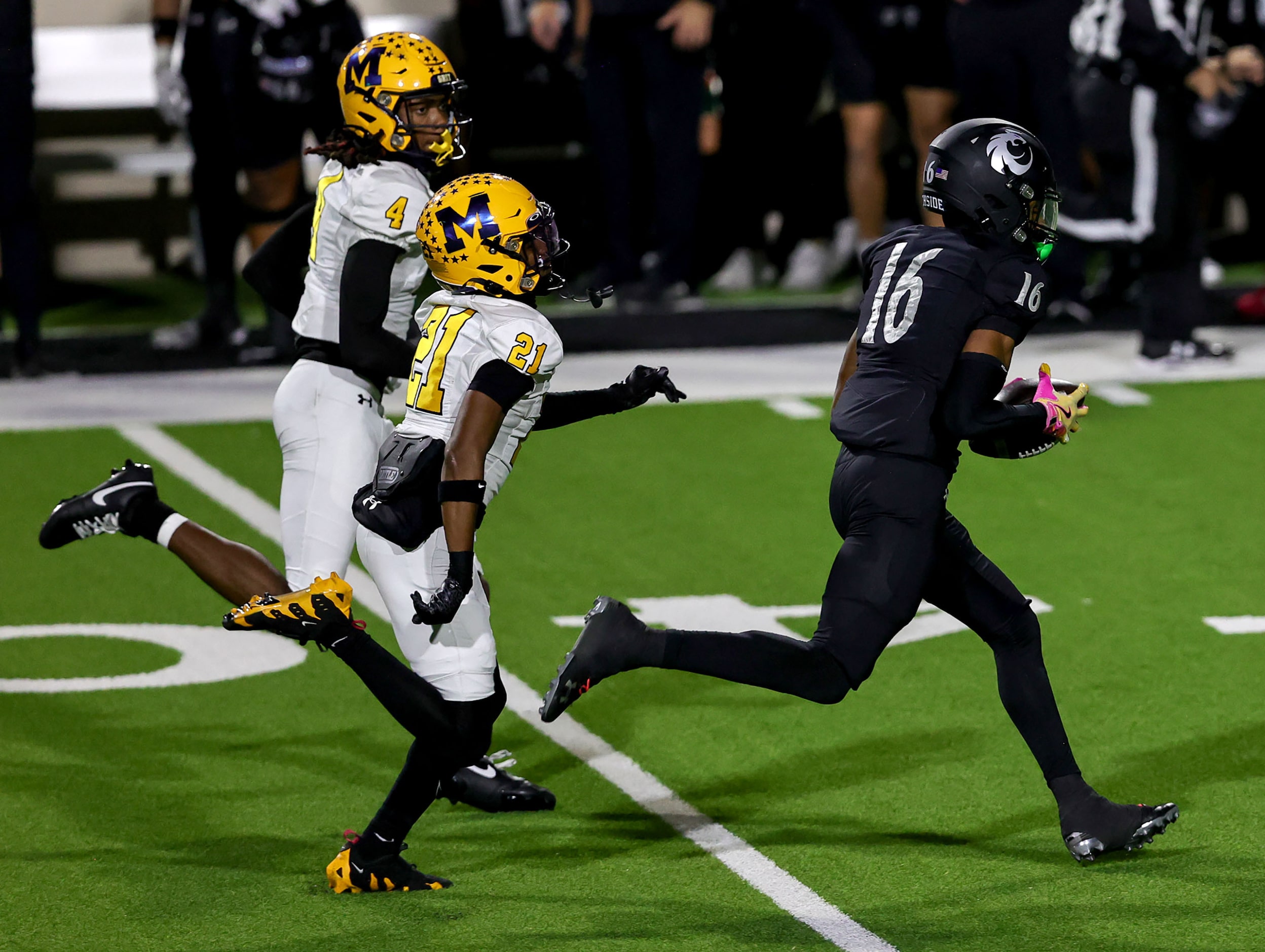 Denton Guyer wide receiver Mason White (16) hauls in a long reception against McKinney...