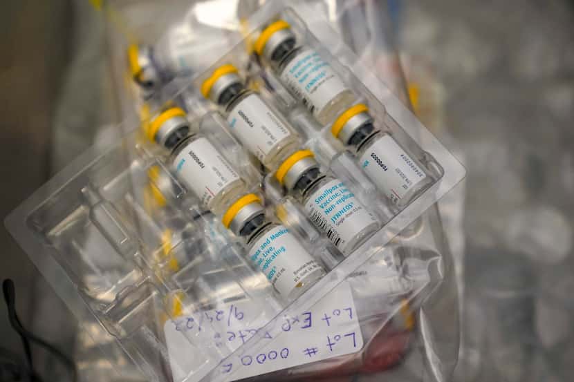 Monkeypox vaccine is stored inside a cooler during a vaccination clinic at the OASIS...