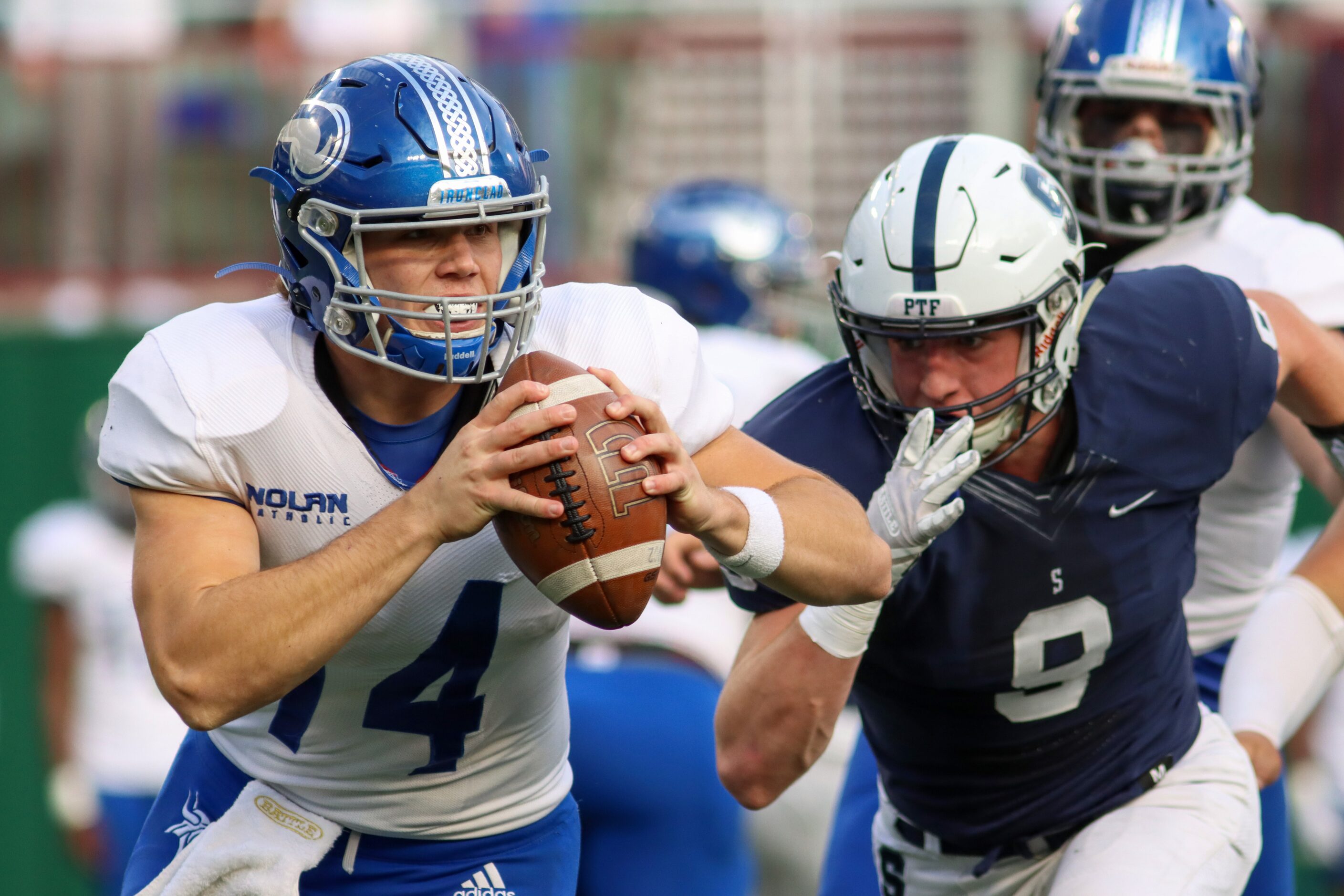 Fort Worth All Saints free safety Robert Sanders (9) chases Fort Worth Nolan quarterback...