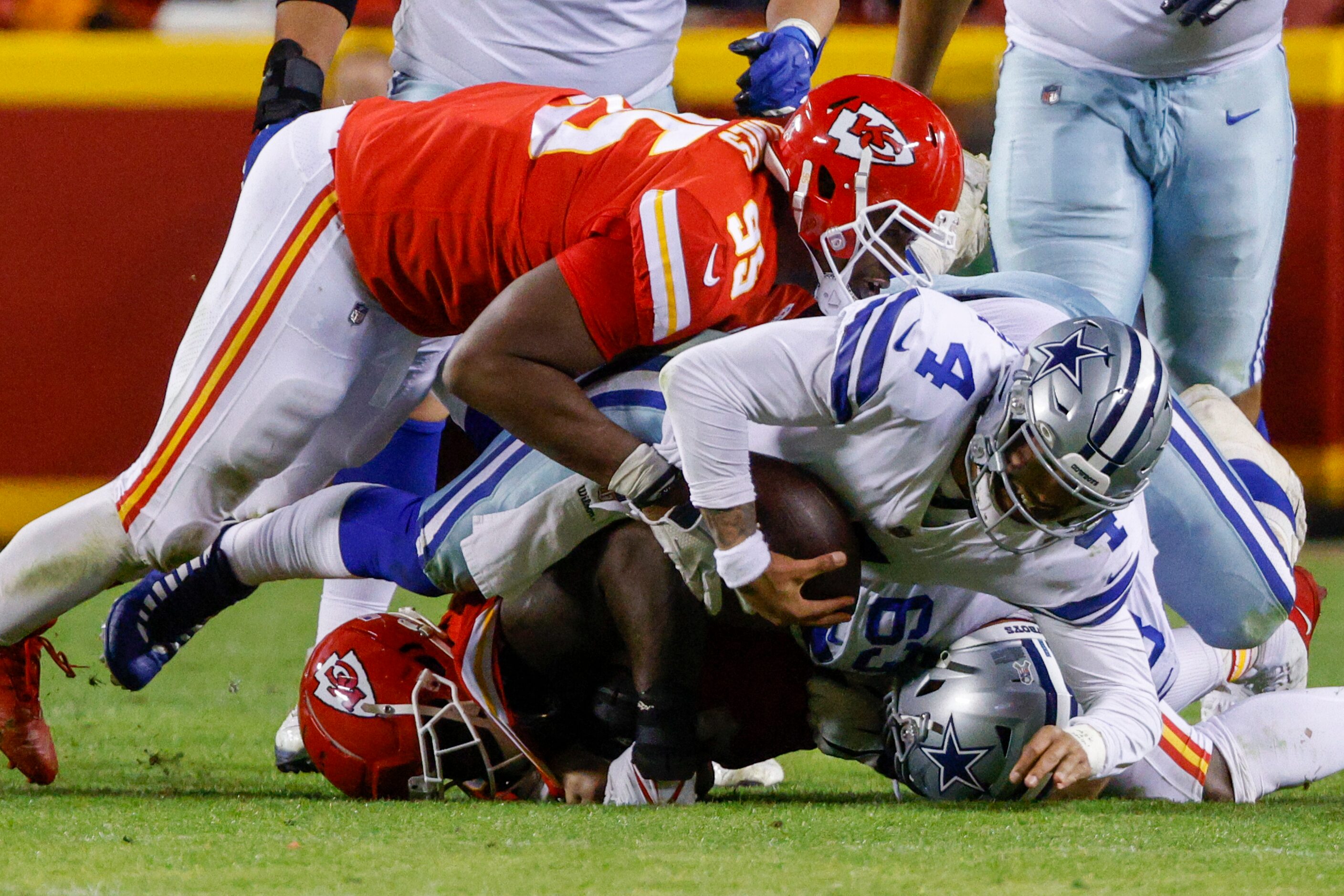 Kansas City Chiefs defensive end Chris Jones (95) and defensive tackle Jarran Reed (90) sack...