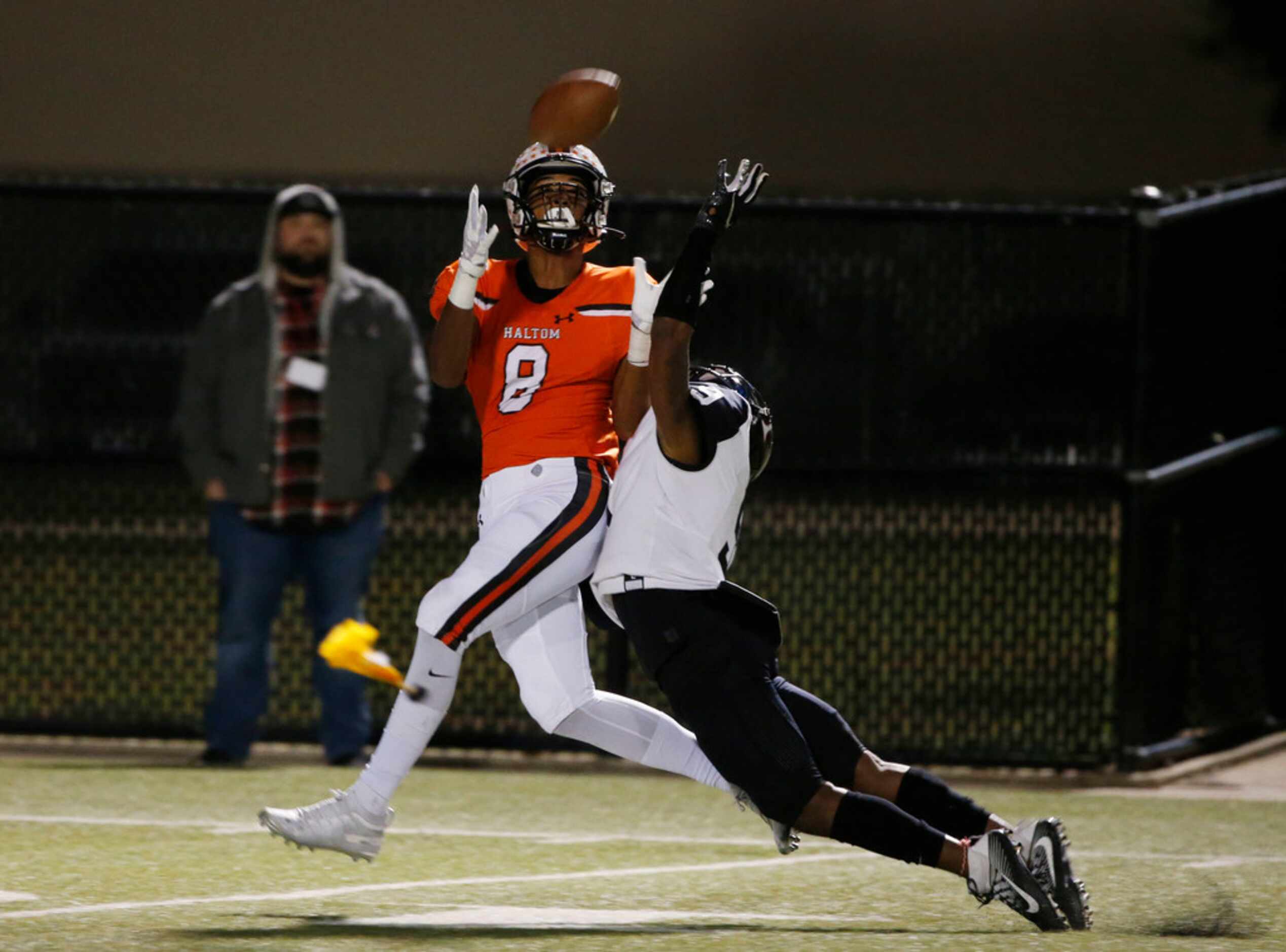 Haltom's Jace Washington (8) fails to catch a pass, but is interfered with by Euless...