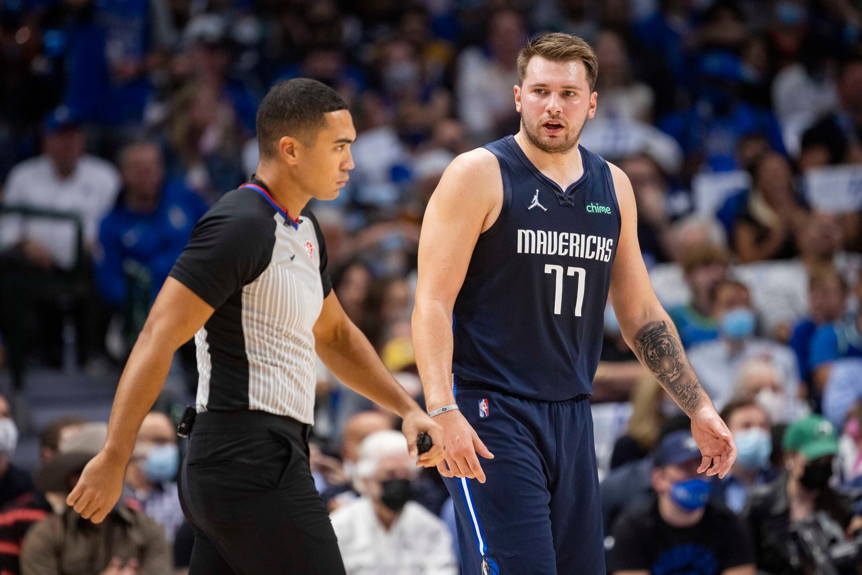 Dallas Mavericks guard Luka Dončić (77) talks to a ref during the first quarter of the...