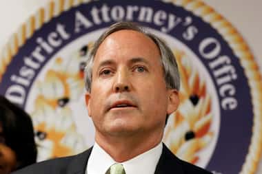 FILE - Texas Attorney General Ken Paxton speaks at a news conference in Dallas on June 22,...