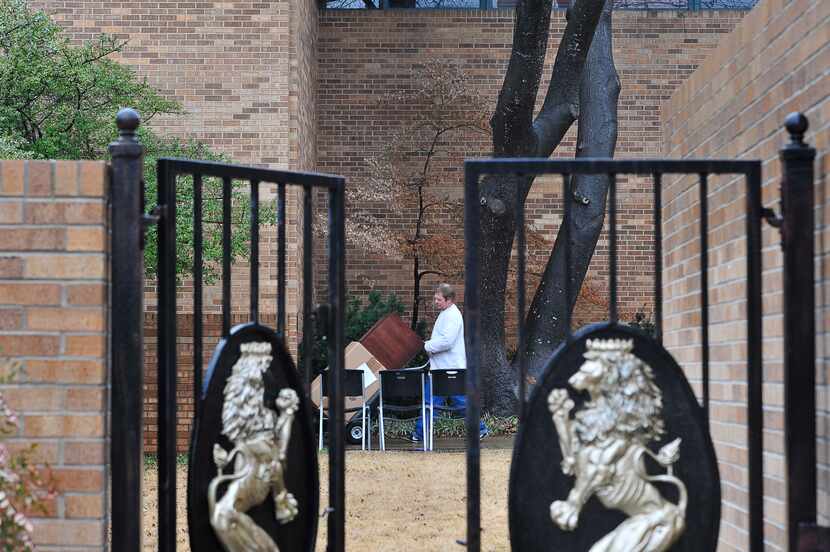 Students move their furniture out of the Sigma Alpha Epsilon house at the University of...