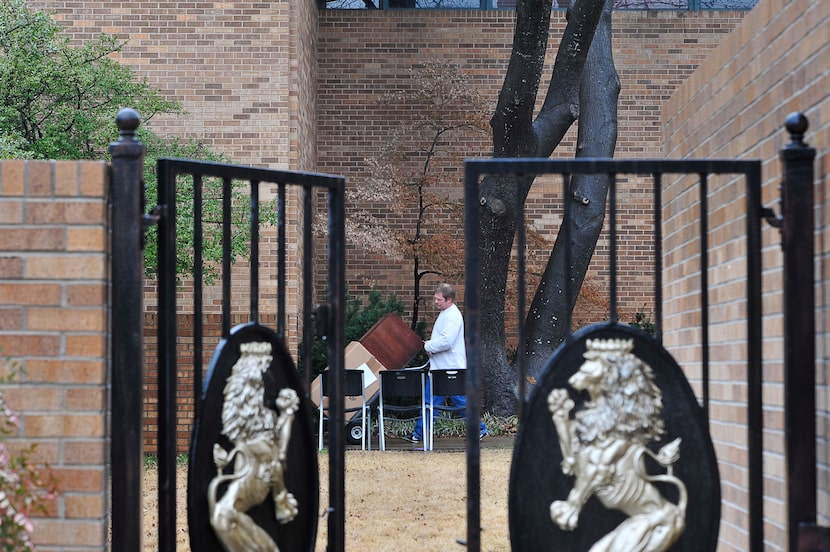 Students move their furniture out of the Sigma Alpha Epsilon house at the University of...