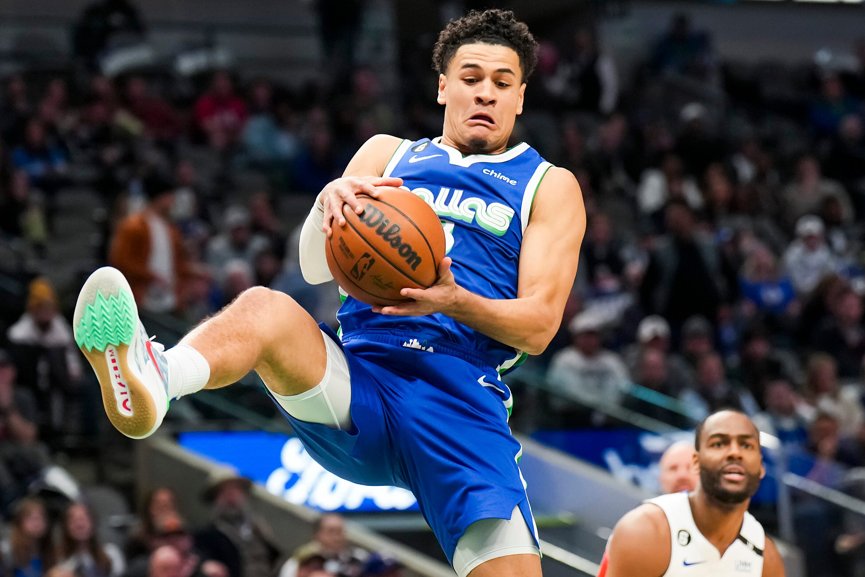 Dallas Mavericks guard Josh Green (8) grabs a rebound during the first half of an NBA...