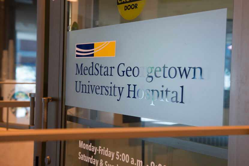 FILE - In this March 28, 2016 file photo, a sign covers the door to MedStar Georgetown...