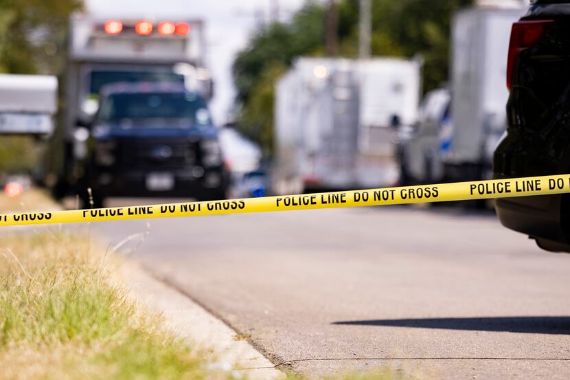 Police taped off the area where a military training aircraft crashed in Lake Worth on Sunday.