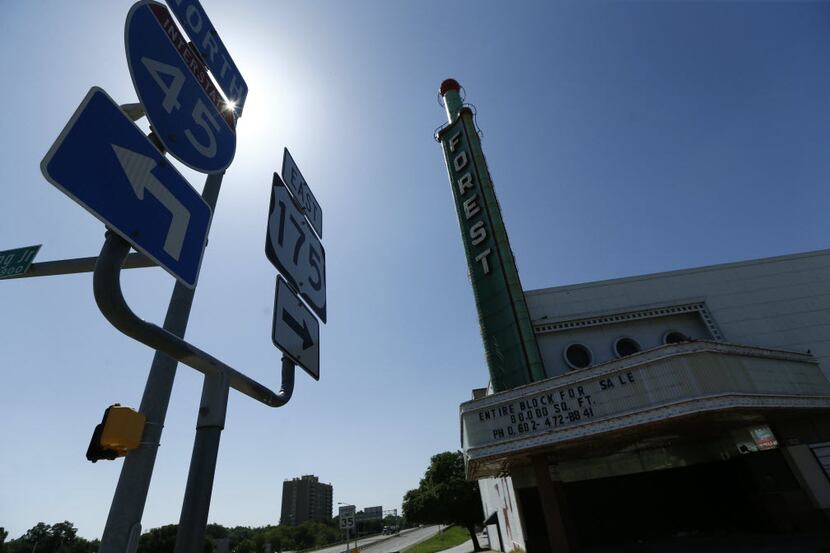 The old Forest Theater that has been abandoned for years at the intersection of Interstate...