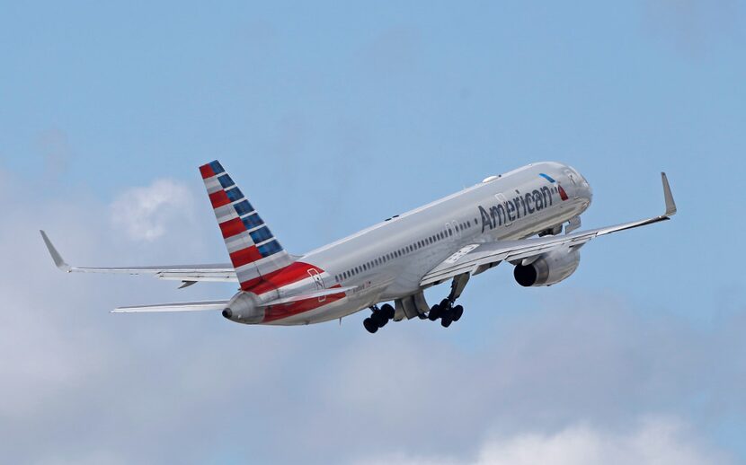 In this Friday, June 3, 2016 file photo, an American Airlines passenger jet takes off from...