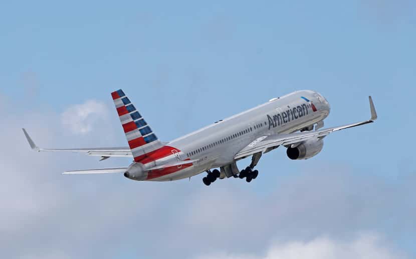 In this Friday, June 3, 2016 file photo, an American Airlines passenger jet takes off from...