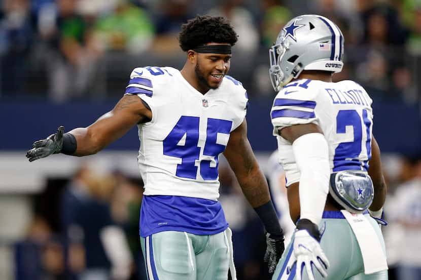 Dallas Cowboys running back Rod Smith (45) and Dallas Cowboys running back Ezekiel Elliott...