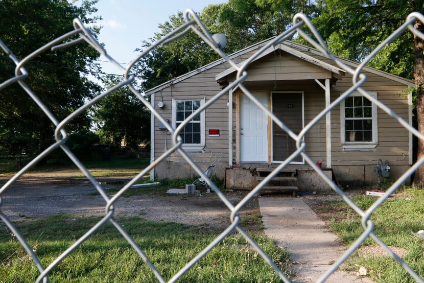 Vacant houses and scraped lots owned by HMK can now be found in West Dallas. HMK sold some...