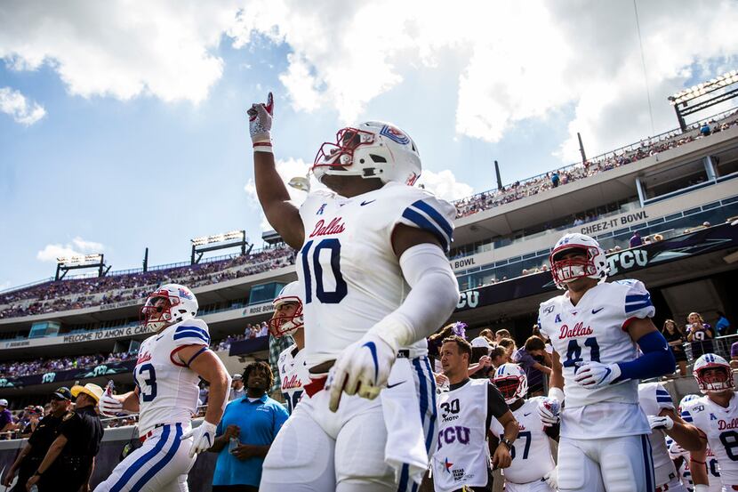 Southern Methodist Mustangs defensive tackle Demerick Gary (10) runs on to the field before...