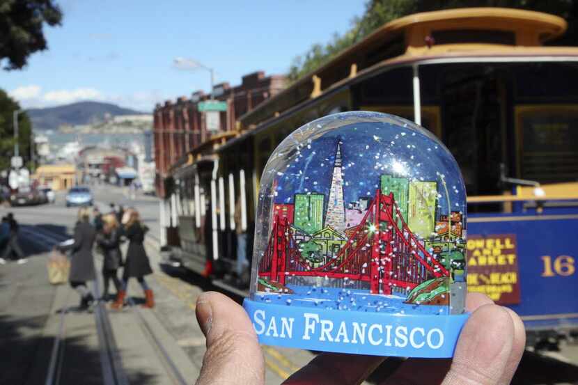 A snow globe depicts the Golden Gate Bridge in San Francisco