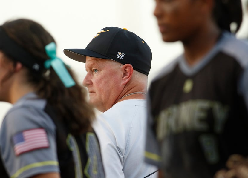 Forney head coach Pat Eitel breaks the huddle after sharing wisdom during the 4th inning of...