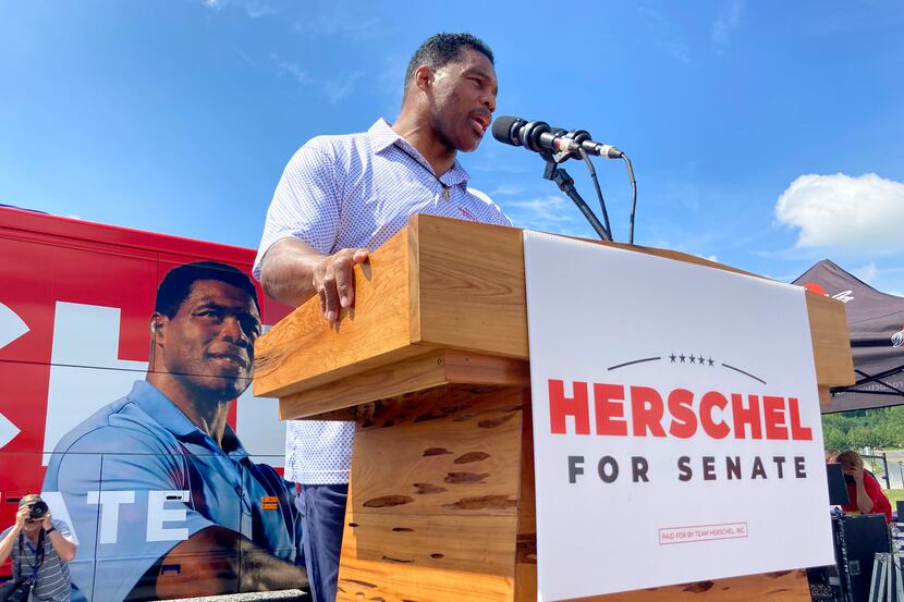FILE - Republican Senate candidate Herschel Walker campaigns Sept. 7, 2021, in Emerson, Ga....