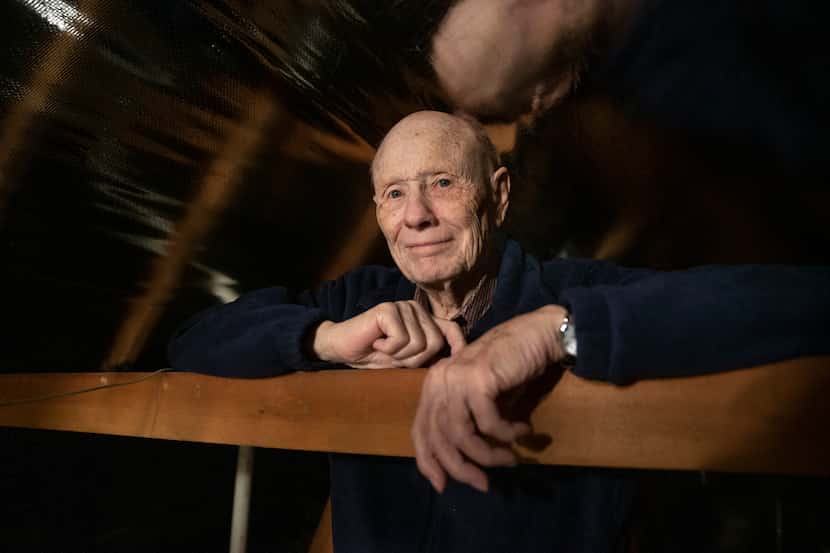 Alan Oldfield, 84, in the attic of his Bedford home. Oldfield said he was taken advantage of...