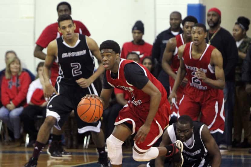 Prime Prep Academy PG Emmanuel Mudiay (0) comes away with a steal against Wichita (Ks.)...