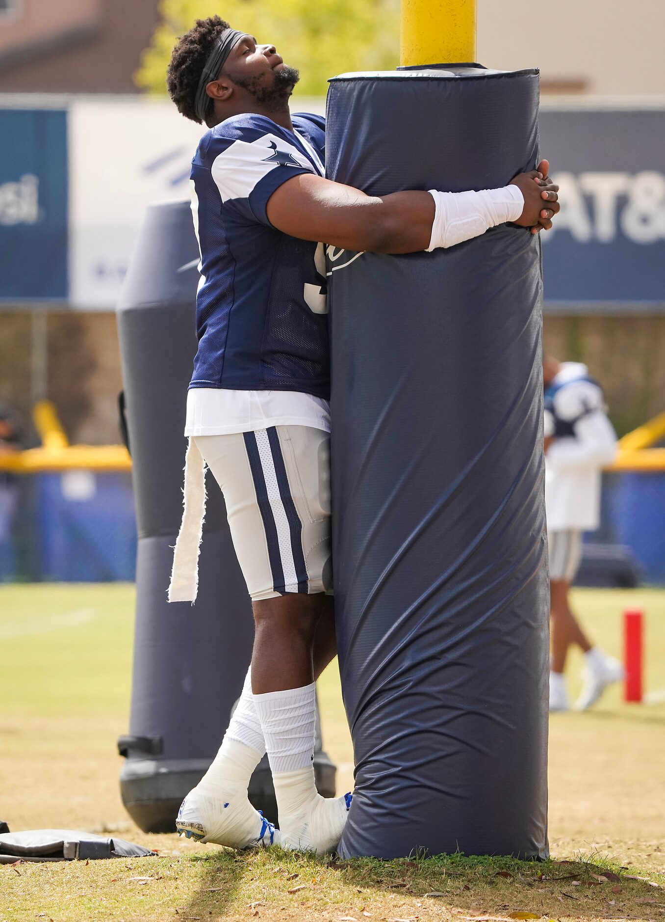 Dallas Cowboys defensive end Ron'Dell Carter (97) stretches during a practice at training...