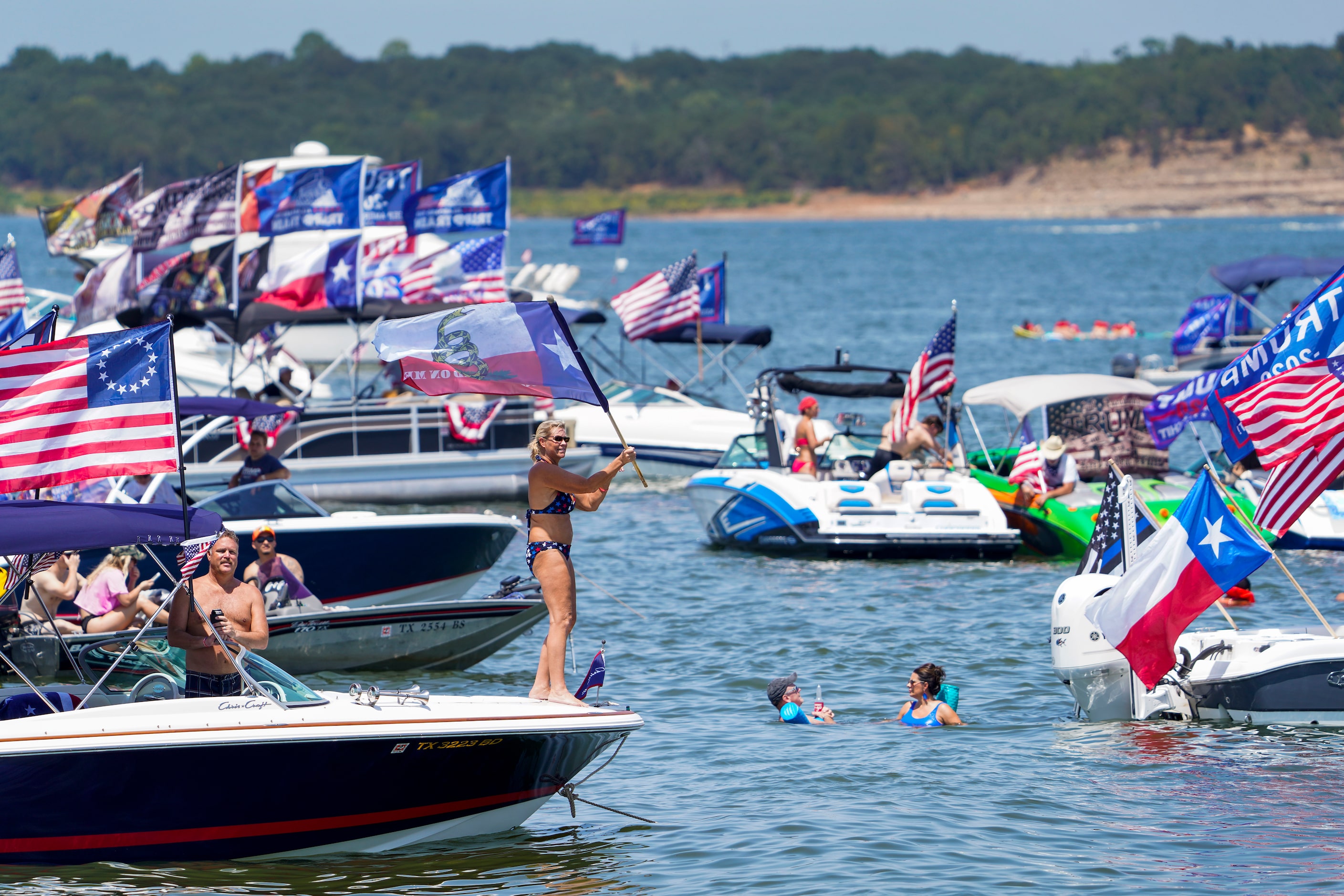 Supporters of President Donald Trump attend a campaign rally and boat parade at Oak Grove...