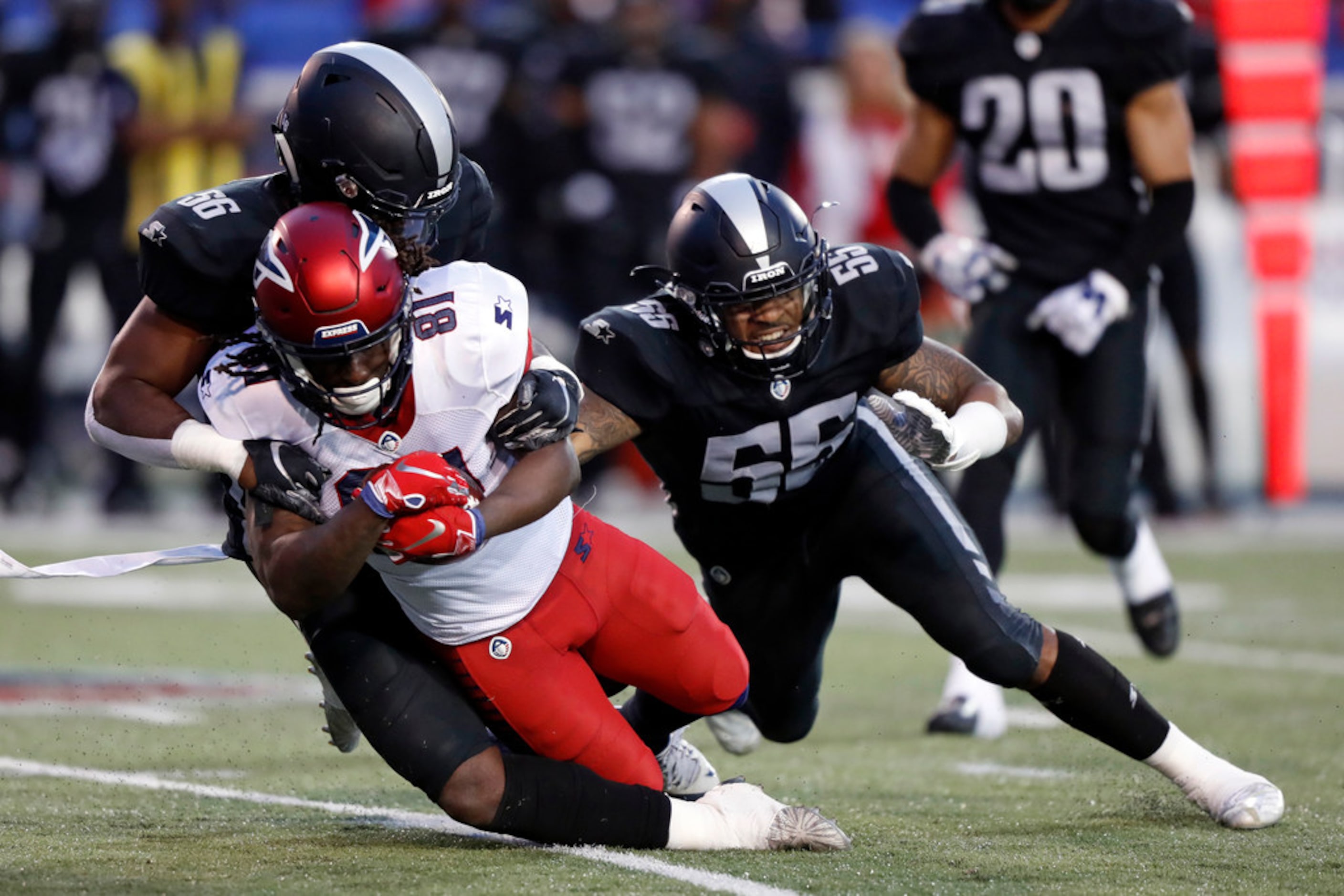 Memphis Express wide receiver Alton "Pig" Howard (81) is tackled by Birmingham Iron...