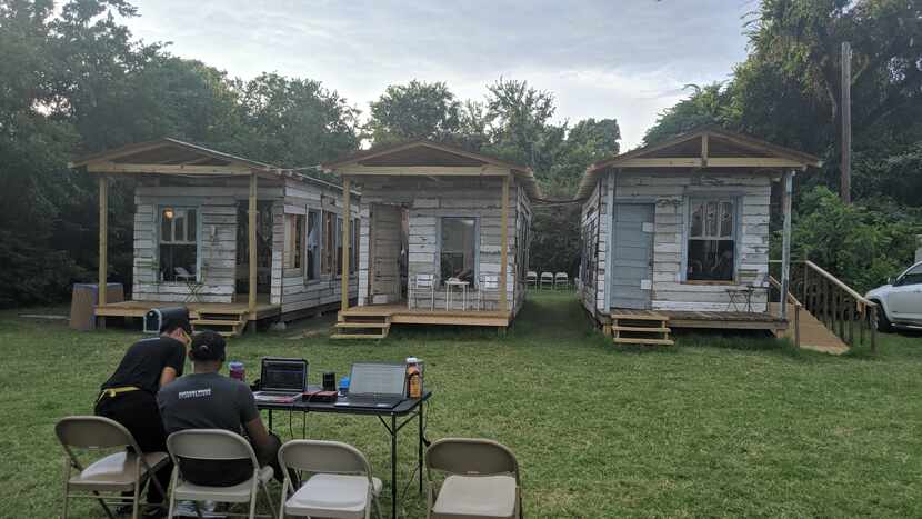 West Dallas performance group Artstillery built skeletal versions of three shotgun houses as...