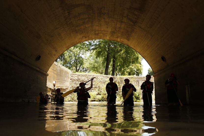 Search One Rescue team resumes their search in the waters under Hall St. on  Turtle Creek in...