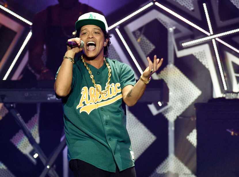 Bruno Mars performs at the 2016 Jingle Ball at Staples Center on Friday, Dec. 2, 2016, in...