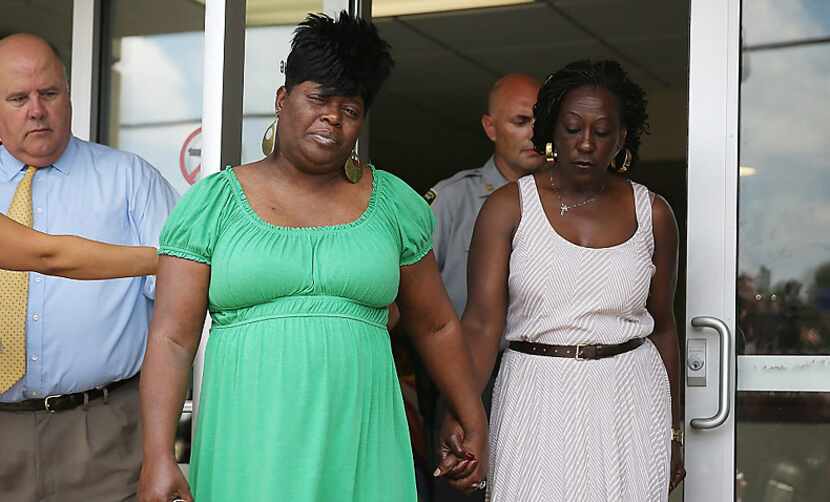 Nadine Collier (left), whose mother was among nine people killed Wednesday night at the...