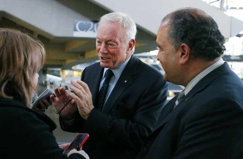 Frisco Mayor Maher Maso, right, listens as Cowboys owner Jerry Jones talks with the media as...