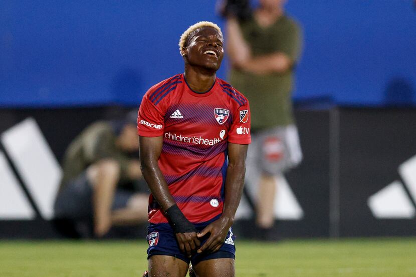 FC Dallas forward Bernard Kamungo (77) reacts after missing a shot attempt during the second...