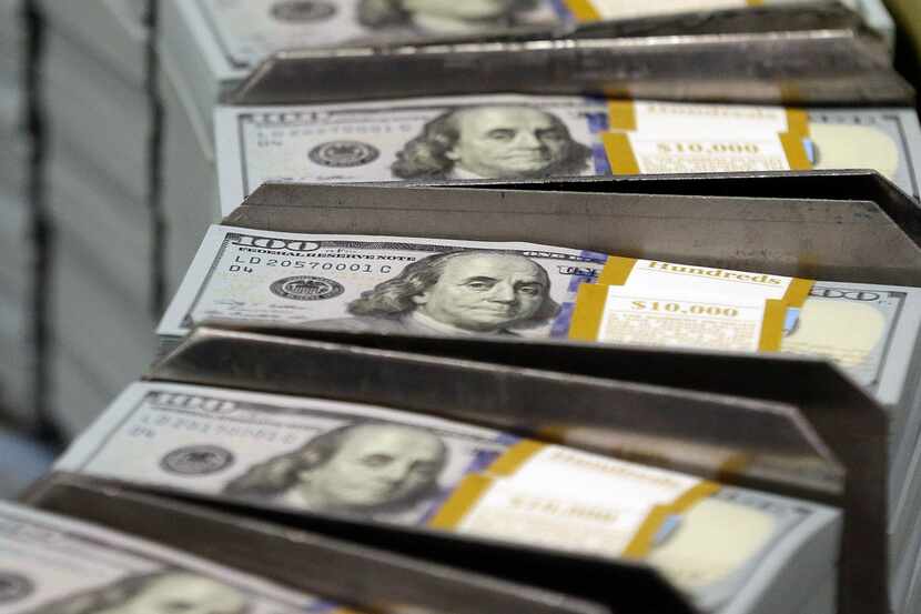 File photo of U.S. $100 bills. 