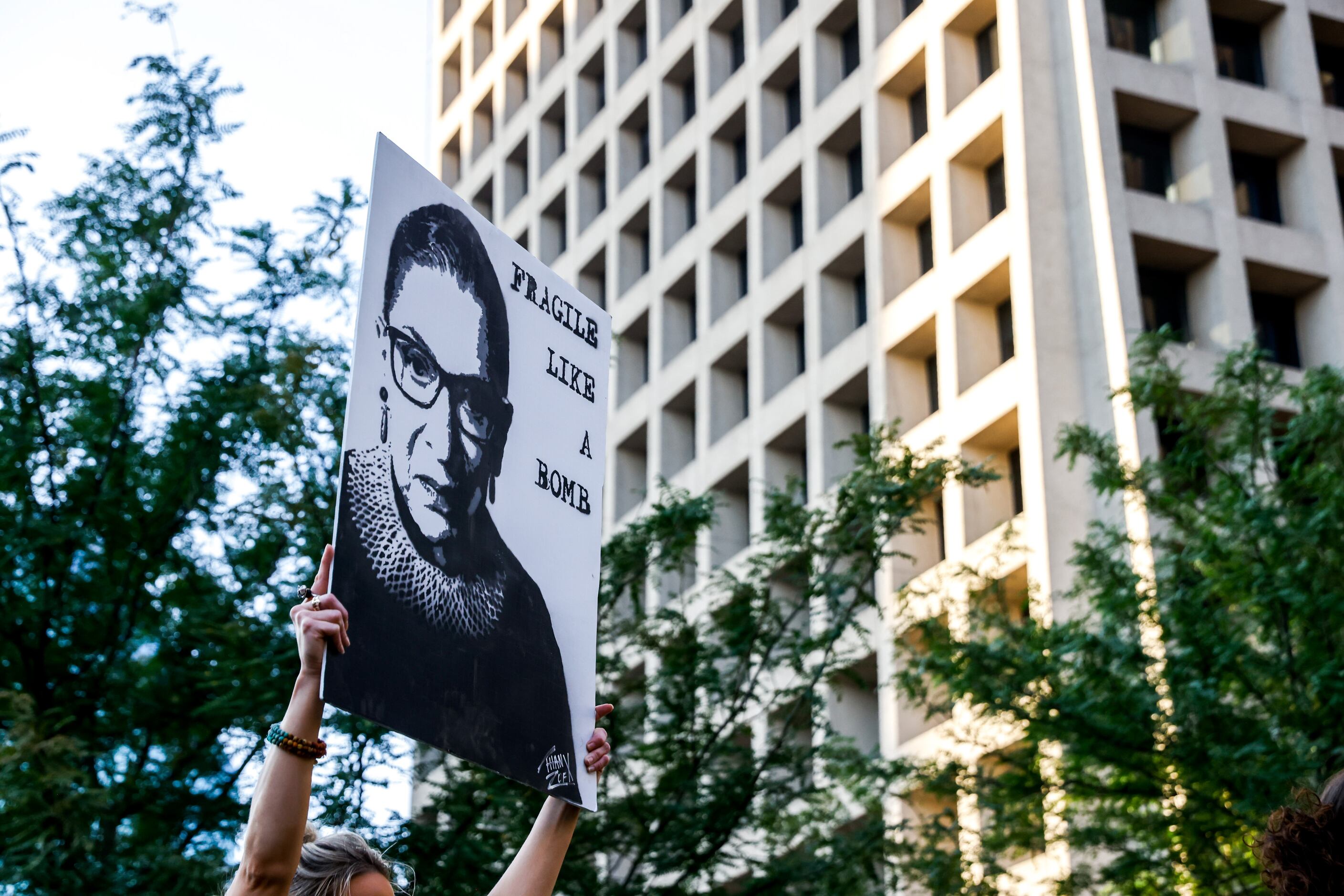 A group of demonstrators gather at the Civic Garden in downtown Dallas on Friday, June 24,...