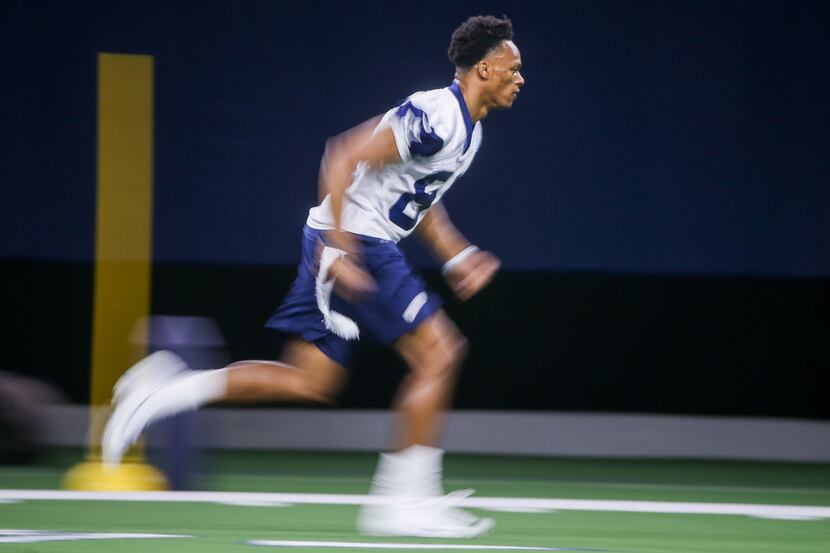 Cowboys wide receiver Jon'Vea Johnson (81) runs through a drill during rookie minicamp at...