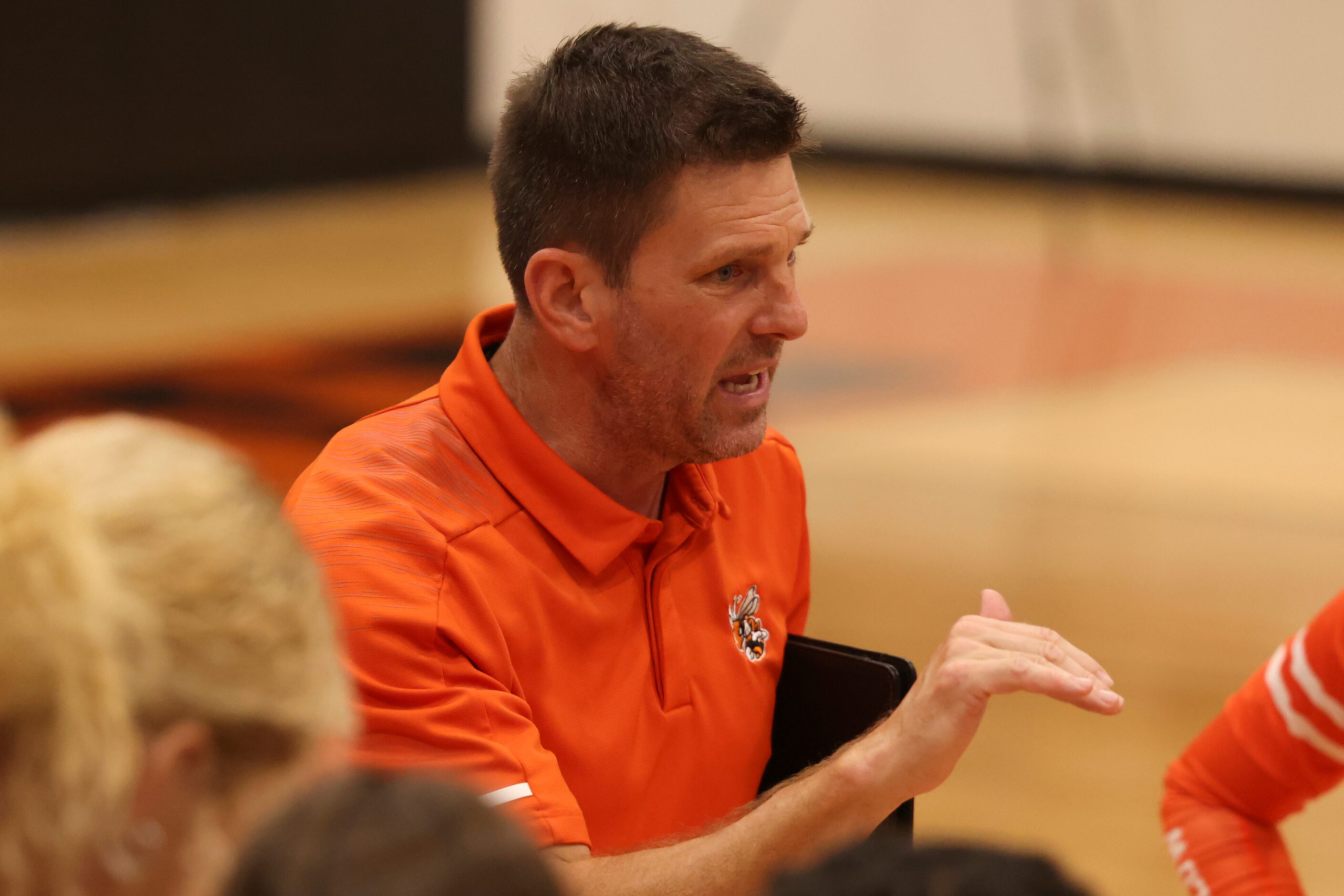 Rockwall High School Head Coach Travis Ferguson coaches during a time out during the...