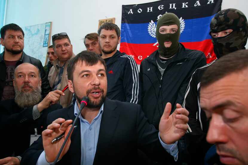 Denis Pushilin, spokesman of the self-appointed Donetsk Peoples Republic, speaks to...