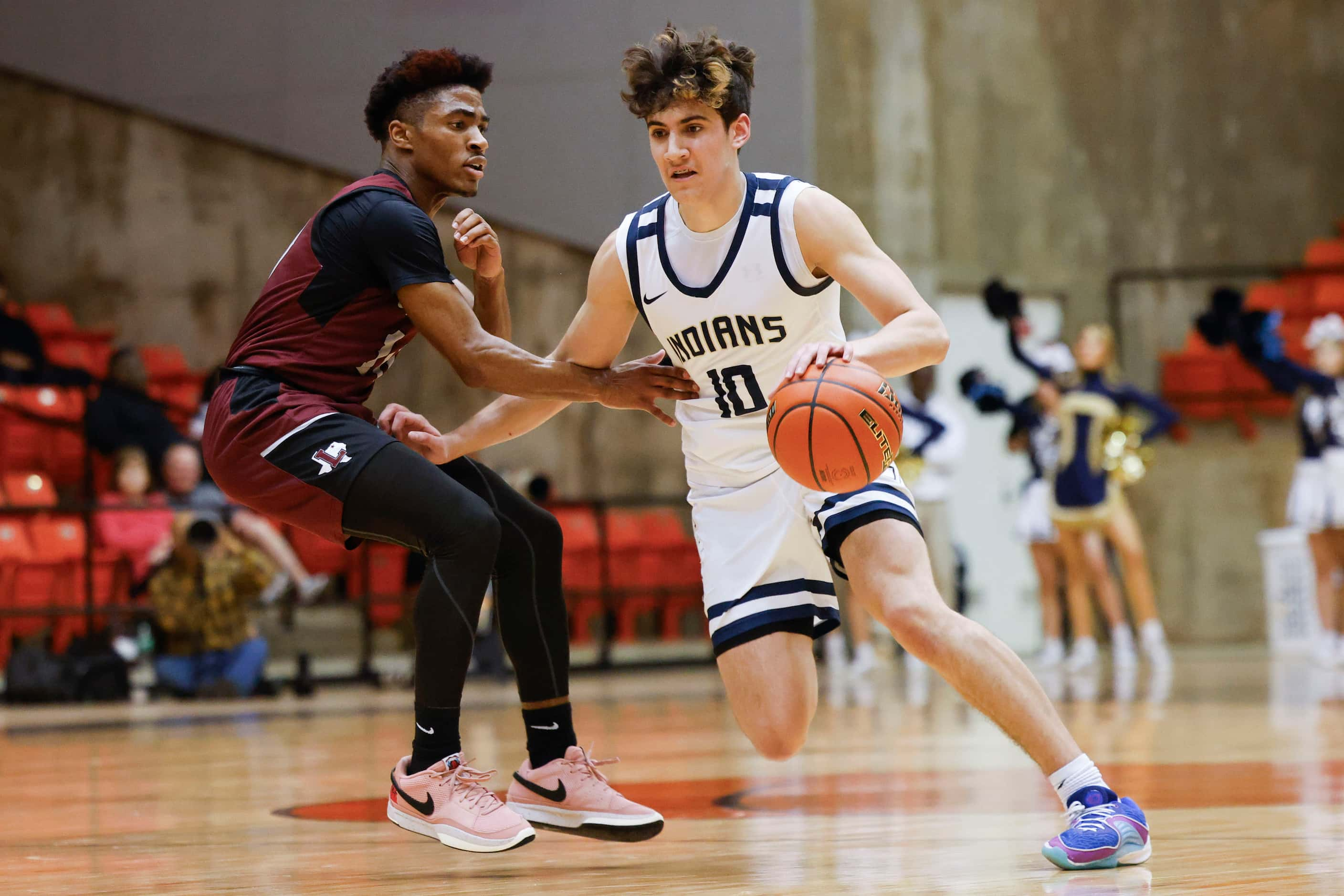 Lewisville High’s Princeton Green (left) defends against Keller high’s Steven Ramirez during...