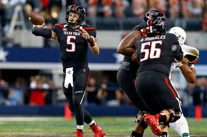 Texas Tech Red Raiders quarterback Patrick Mahomes (5) throws down field in the second...